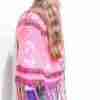 Pineapple Poncho Crochet Pattern – Pink & Purple version on model turned away Pineapple Poncho Crochet Pattern - Pink & Purple version on model turned away