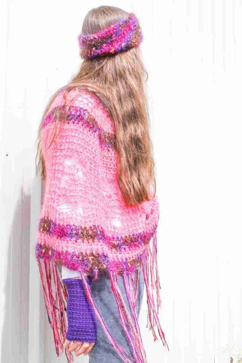 Pineapple Poncho Crochet Pattern – Pink & Purple version on model turned away Pineapple Poncho Crochet Pattern - Pink & Purple version on model turned away