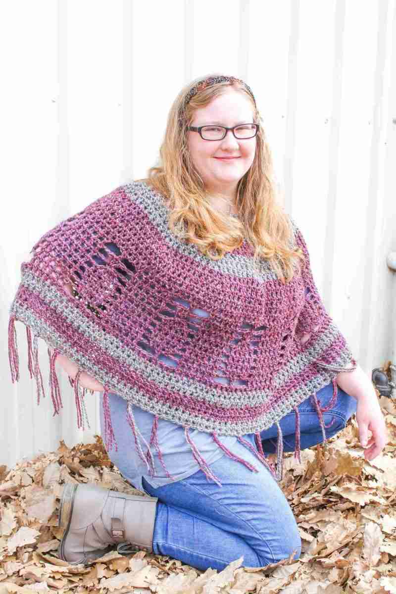 Pineapple Poncho Crochet Pattern – Purple & Grey version on kneeling model Pineapple Poncho Crochet Pattern - Purple & Grey version on kneeling model