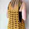 Fantail Vest Crochet Pattern by ReVe Design Co – Mustard cotton – modeled – from back Fantail Vest Crochet Pattern by ReVe Design Co - Mustard cotton - modeled - from back