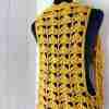 Fantail Vest Crochet Pattern by ReVe Design Co – Mustard cotton – on manequin – from back Fantail Vest Crochet Pattern by ReVe Design Co - Mustard cotton - on manequin - from back