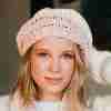 Charlston Beanie Crochet Pattern - light and lacy woman's hat - up close on model from front