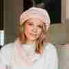 Pink and White Charlston Beret and Cowl on model from front - model with head slightly tilted to side