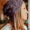 Rapt-Hearts-Beanie-Crochet-Patterns---in-mauve---on-Model-indoors-(2)