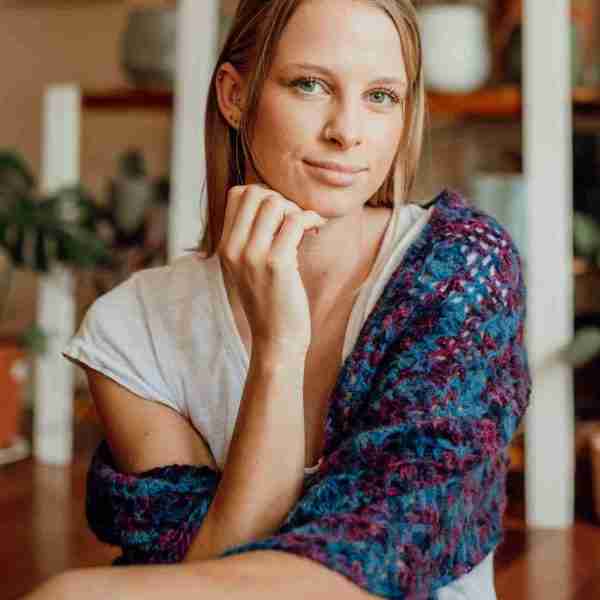 Rapt-in-Hearts-Crochet-Pattern---in-Purple,-Teal-Possum-blend-yarn---on-model-(3)