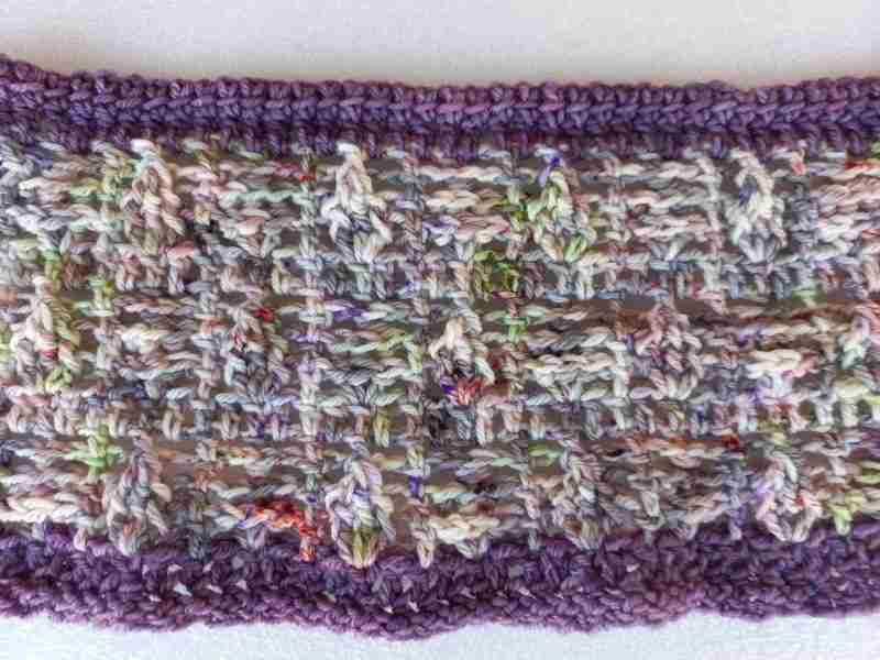 Dew Drops Cowl in 2-tone Premium Hand-dyed sock wool – colors Farmer’s Market and Aubergine. Close Up of pattern Dew Drops Cowl in 2-tone Premium Hand-dyed sock wool - colors Farmer's Market and Aubergine. Close Up of pattern