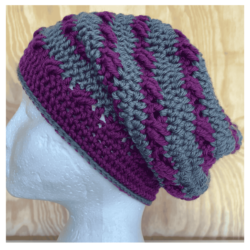 Brindy Beanie - Lori's version in cerese and grey - on foam head from side
