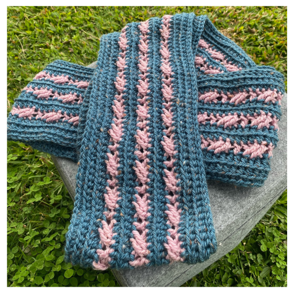 Brindy Cowl Crochet Pattern - Lori's version - in Mid-blue and Pink- full-shot from side on concrete & grass