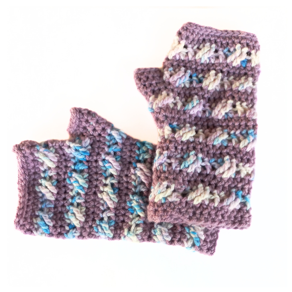 Brindy Mitts Crochet Pattern in Mauve and Variegated blue & pink - flatlay at right angles